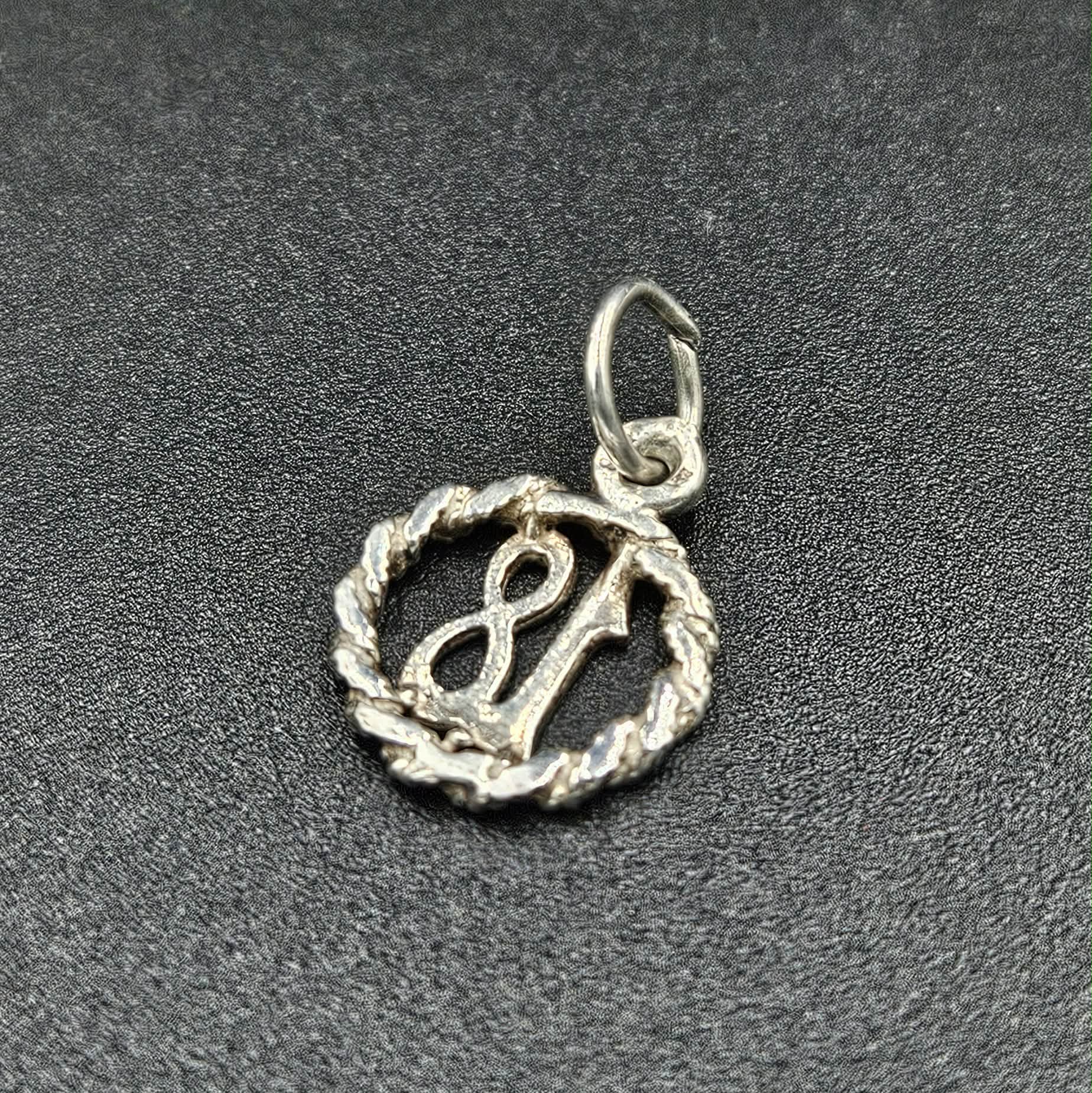 Silver 18th Charm