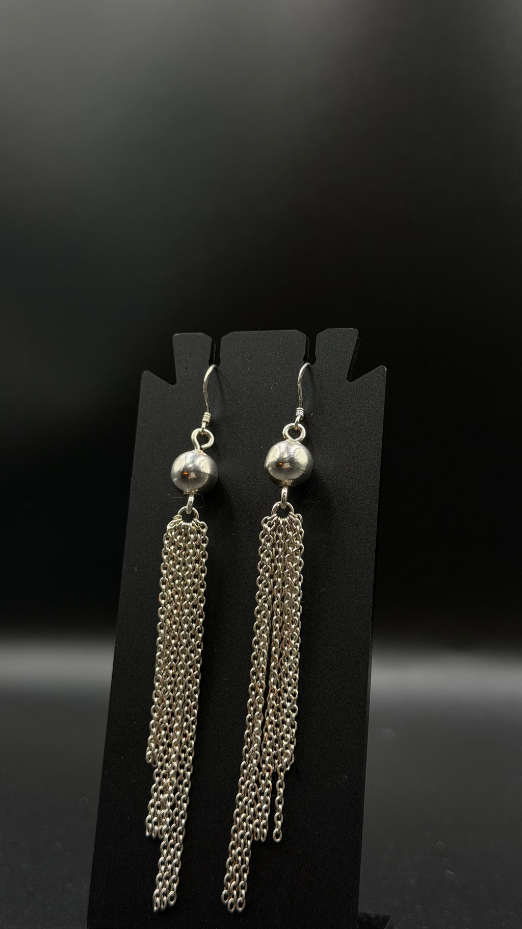 silver ball long earrings