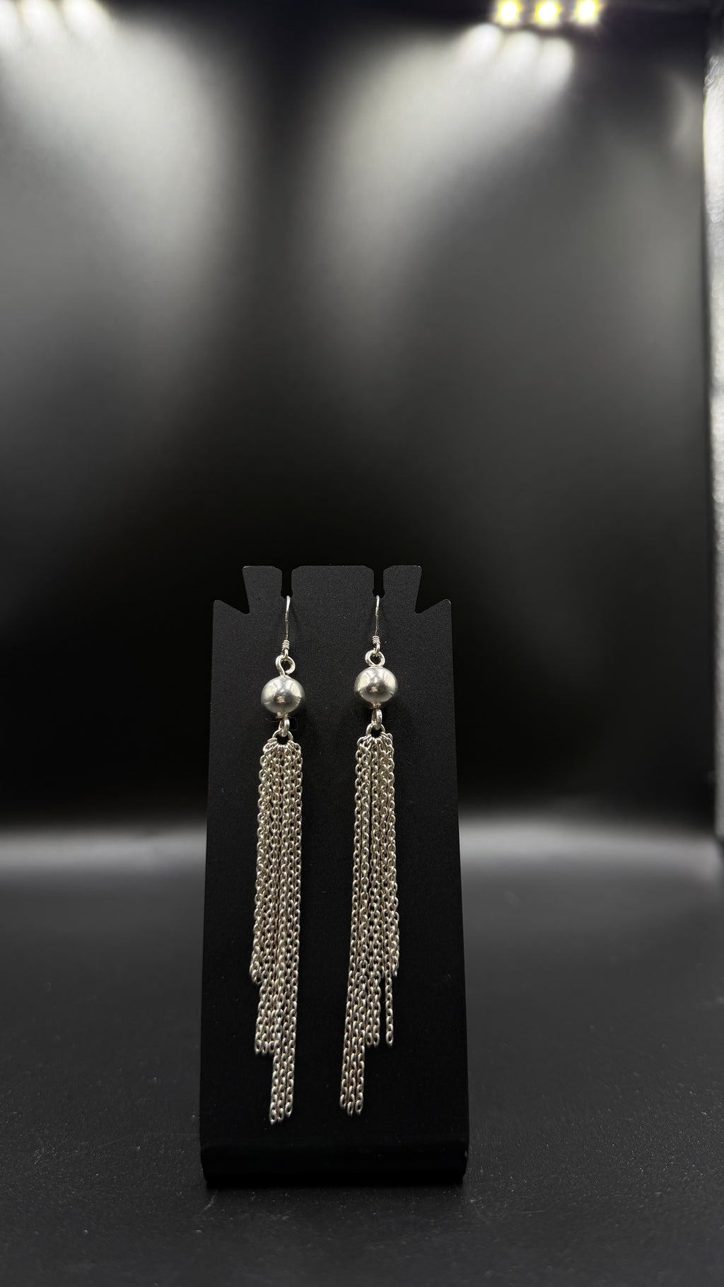 silver ball long earrings