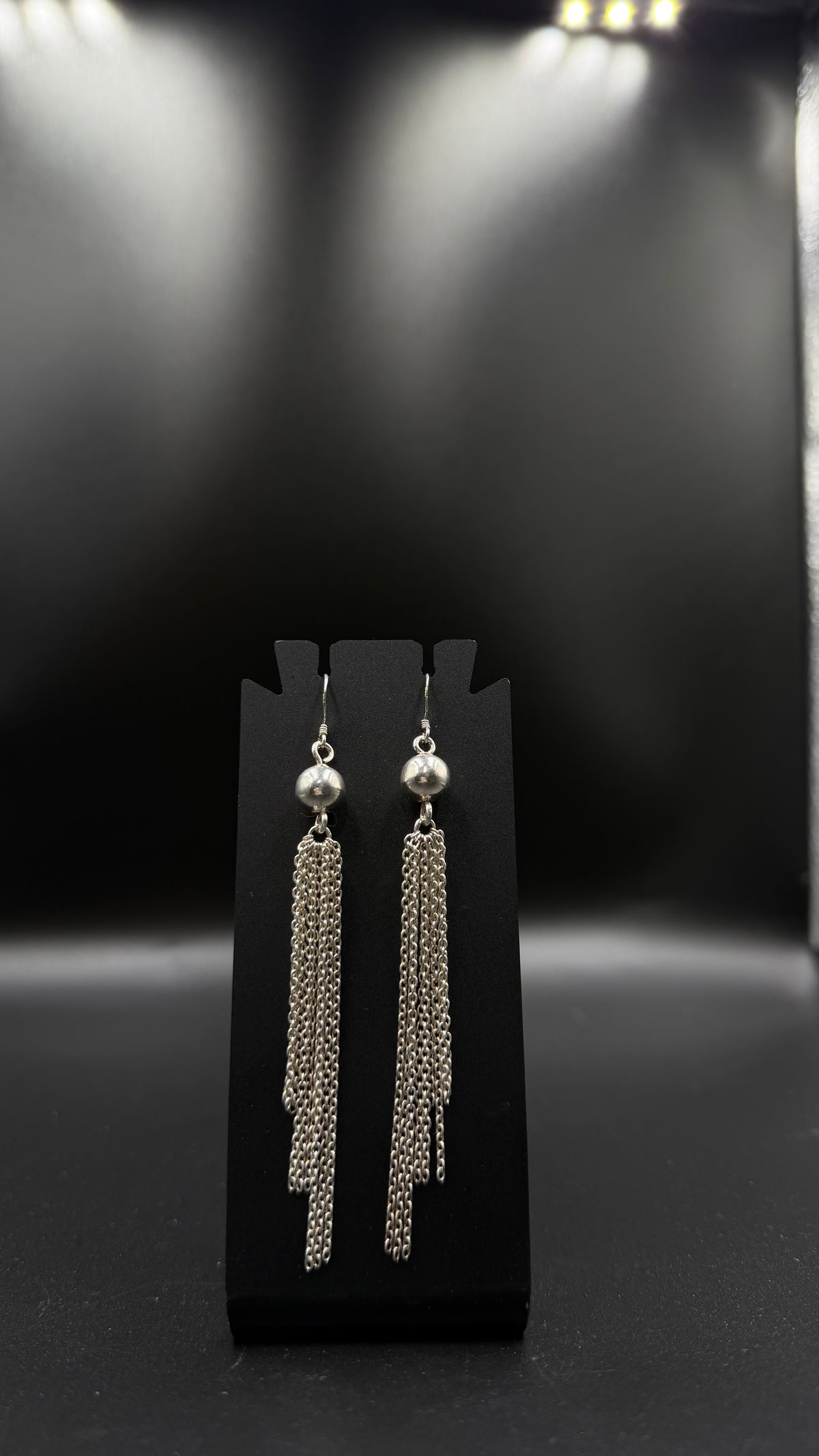 silver ball long earrings