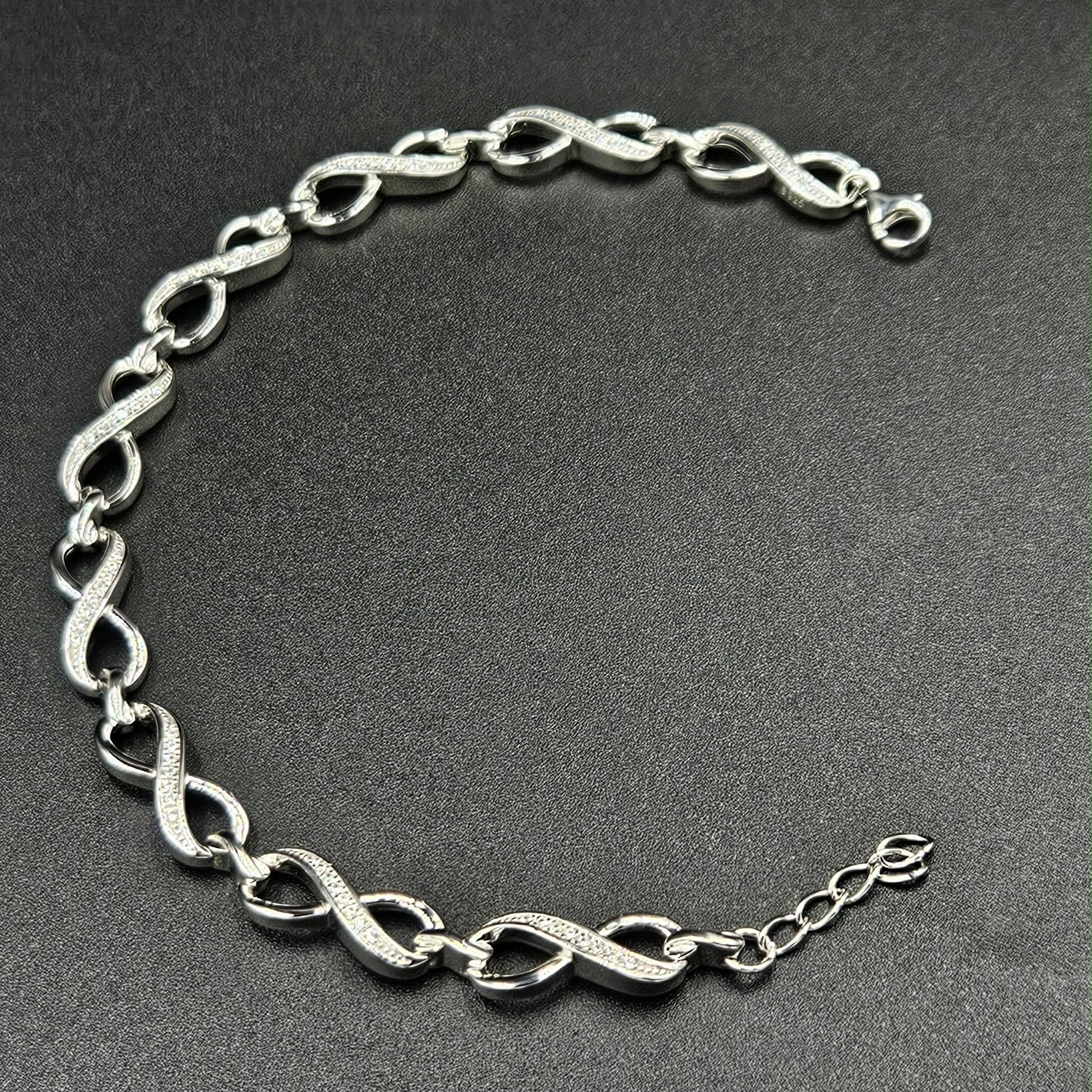 Brand New, Sterling Silver Cubic Zirconia Infinity Bracelet